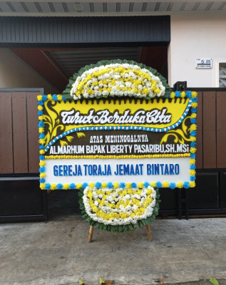 Papan Bunga Duka di Kakaskasen
